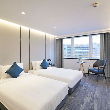 Hotel Cozi Oasis Гонконг Экстерьер фото